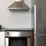A Studio Apartment With Workspace