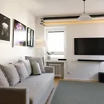 A Studio Apartment With Workspace