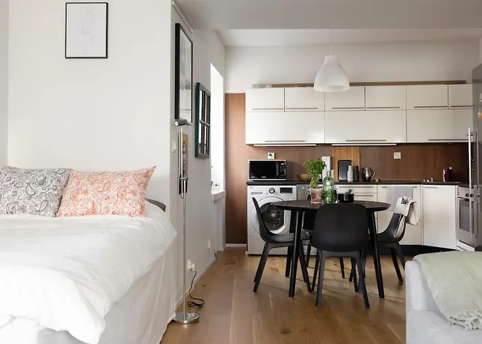 A Studio Apartment With Workspace